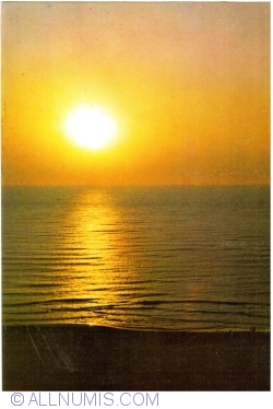 Saturn - Sunrise at sea