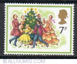 Image #1 of 7 Pence Singing Carols round the Christmas Tree