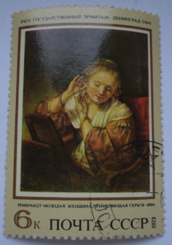6 Kopeici 1973 - Tânără care încearcă cercei, Rembrandt (1654)