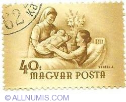 Image #1 of 40 filler 1954 - Mother receiving newborn baby
