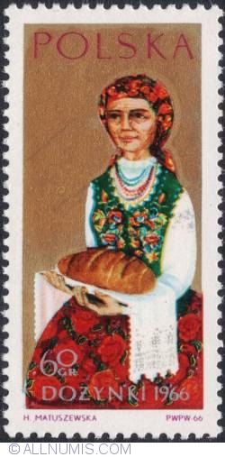 60 groszy1966 - Woman holding loaf of bread.