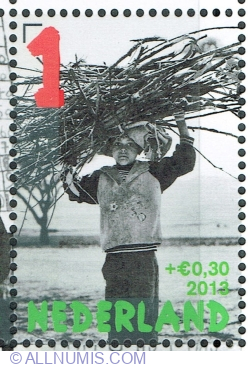 1° + 0.30 Euro 2013 - Little boy with bundle of branches